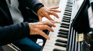 Boost your mental health elderly man playing piano